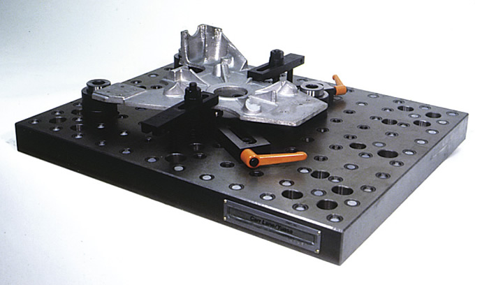 Irregularly shaped parts, such as this casting, can be clamped directly to a modular baseplate. Image courtesy Carr Lane Manufacturing.
