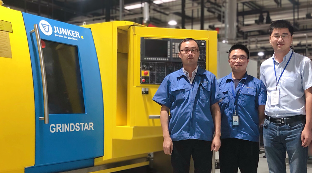 From left to right: Ding Yu, project manager, and Ge Wei, production engineer both of Weifuautocam; and Sun Wenlai, area sales manager of Junker Shanghai Representative Office. Source: Junker