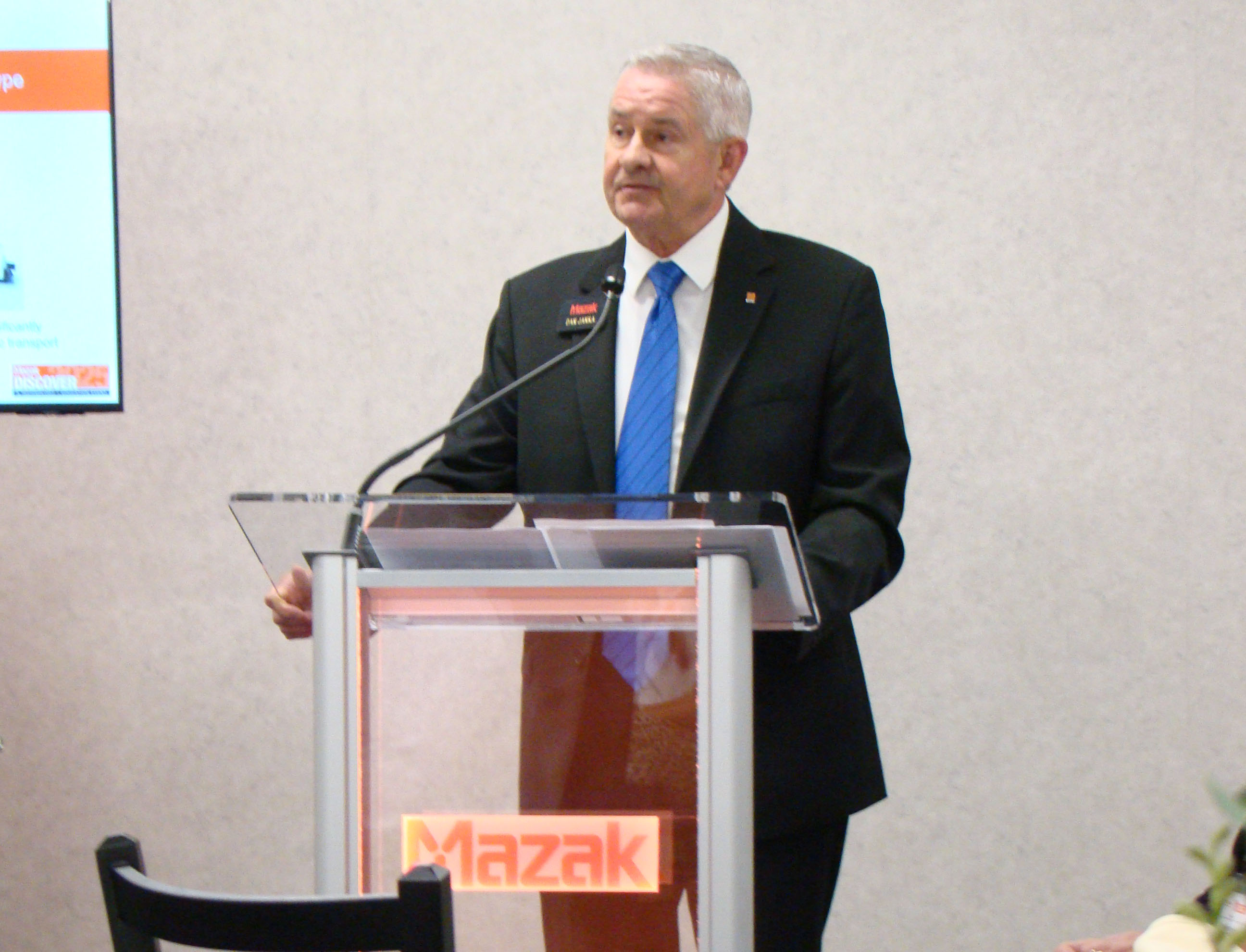 Dan Janka, president of Mazak Corp., provides a presentation at the press breakfast