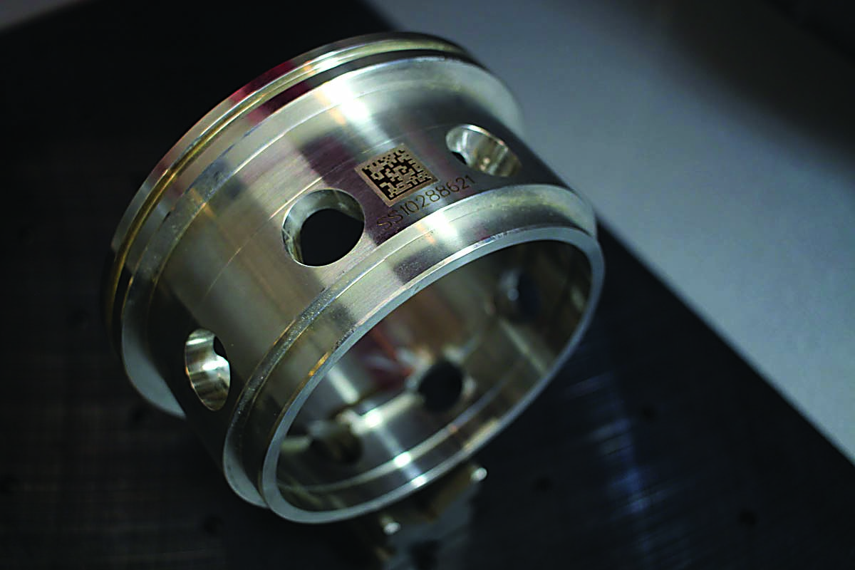 Laser marking parts when they’re manufactured heads off problems created by counterfeit parts. This aerospace part is marked with a 2D Data Matrix and serial number indicating information about the part.