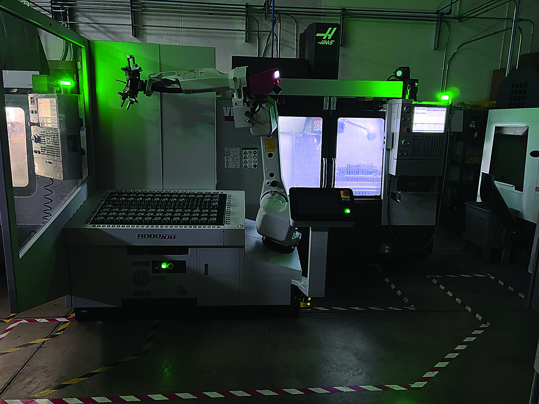 Appreciation for CNC machine-tending robots is rising in the industry.