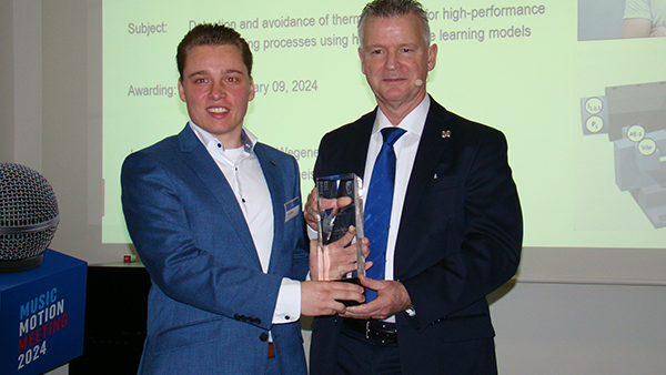 Dr. Emil Sauter from the Institute for Manufacturing Technology and Machine Tools at ETH Zurich receives the 2023 Fritz Studer Award from Daniel Huber, Studer’s chief technology officer.