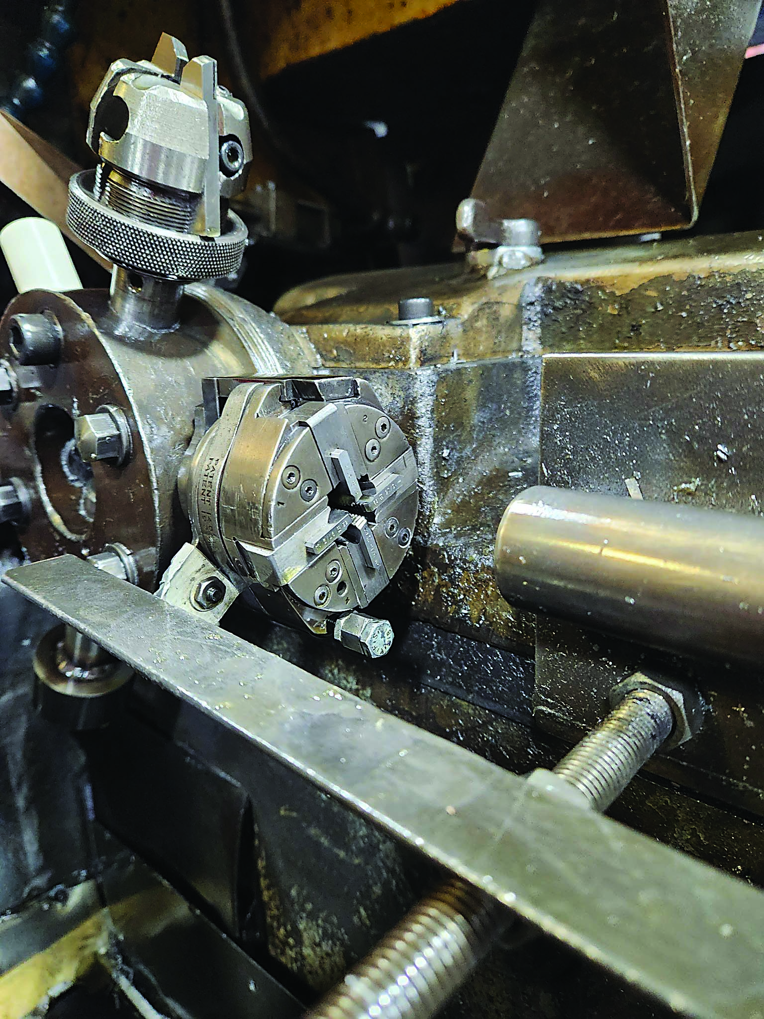 The die head is displayed in a manual Brown & Sharpe screw machine.