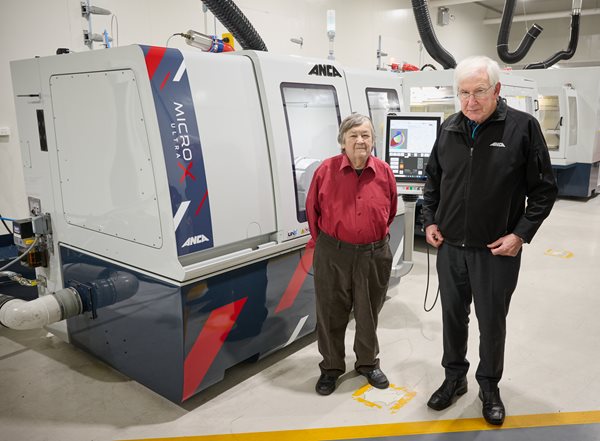Pat and Pat with new CNC ANCA machinery