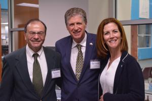 author Gerald Carbone, R.I. Lt. Gov. Dan McKee, emcee Bridget Benedetti