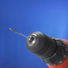 Photo courtesy of Brush Research Manufacturing Co. Inc. Removing microburrs from small-diameter internal and external threads