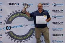 Philip Paull, of Noblesville, Ind., owner of Excavating Solutions won a Hurco VMX42i CNC mill at the Chipmaker Challenge Championship that was held at the Hurco IMTS booth in Chicago September 9.