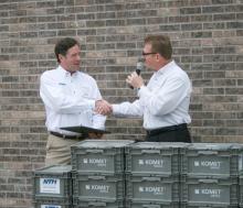 Tom Whennen (right), manager of KOMET SERVICE North America, hands the official KOMET SERVICE Partner plaque to Pat Mullins, President and CEO of NTM, Inc, thus marking the official opening of NTM, Inc as a KOMET SERVICE Partner. Tom Whennen (right), manager of KOMET SERVICE North America, hands the official KOMET SERVICE Partner plaque to Pat Mullins, President and CEO of NTM, Inc, thus marking the official opening of NTM, Inc as a KOMET SERVICE Partner.