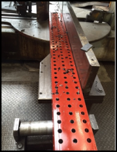 Steel company produces bolt holes in structural steel beams. Whitepaper: Structural steel market looking to make more parts in less time