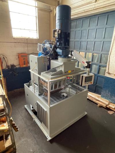 Gearless Multi-Spindle Tapping Machine Provides Progressive Die Tapping