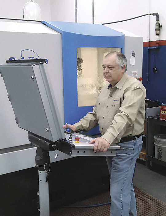 Eddie Boland, Crowley Tool machine operator and toolmaker, says the Schütte 325linear grinder allows him to quickly produce flutes in tools, owing to the subroutines and macros on the machine. All images courtesy Justin Maxey, Crowley Tool.