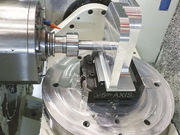 5th Axis workholders can grip large parts, such as this aluminum mounting bracket, even when there’s a minimal amount of workpiece material to grip. Image courtesy Wagner Machine.