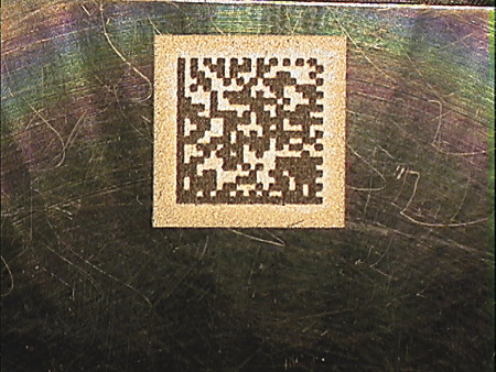 A%202-dimensional%20coded%20matrix%20applied%20to%20a%20motor%20top%20using%20Miyachi%20laser%20technology.tif 