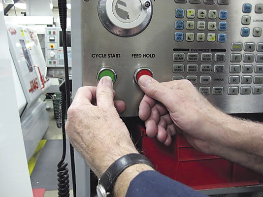 A machinist should toggle between the cycle-start button and the feed-hold button as the cutter approaches the part. If there is a programming error, the machinist is in a good position to catch the error before any material is cut. All images courtesy J. Harvey.