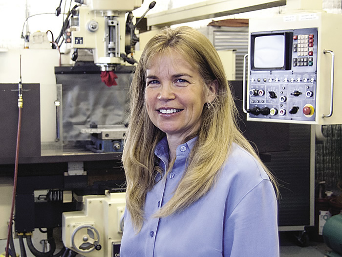 Sheri Dron in the machine shop she started with her husband, Ken.