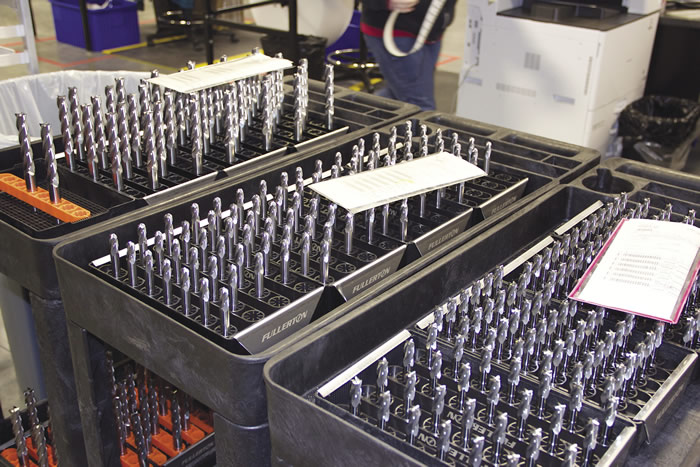Batches of freshly ground carbide endmills are ready for cleaning and subsequent PVD coating. Image courtesy Fullerton Tool.