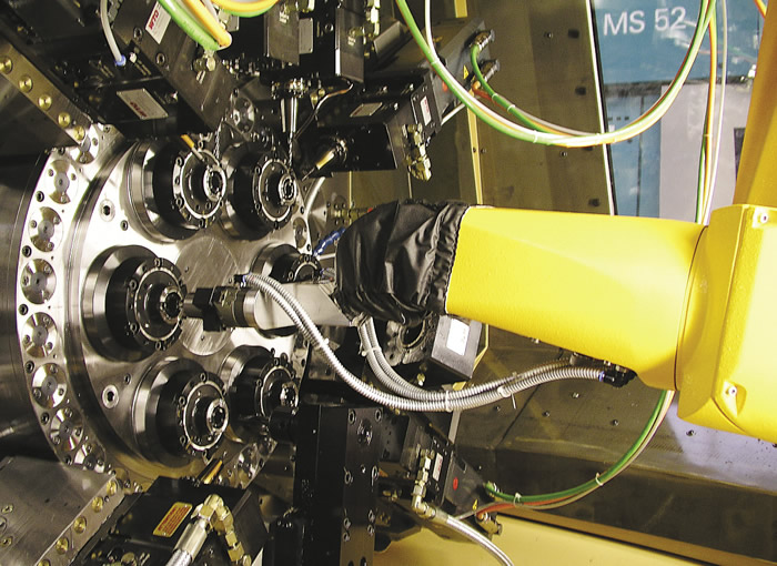 Robotic part handling increases spindle capacity and reduces floor space requirements.