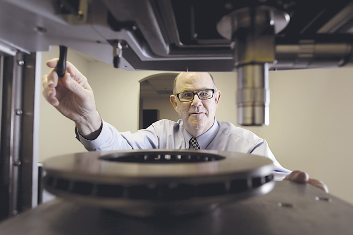 Michigan Metrology’s Donald Cohen operates the NPFlex 3D optical profiler from Bruker. Image courtesy Michigan Metrology.