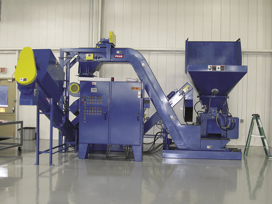 A complete, automated chip processing system from PRAB includes volume reduction, a shredder, a centrifuge and conveyors. Photo credit: PRAB