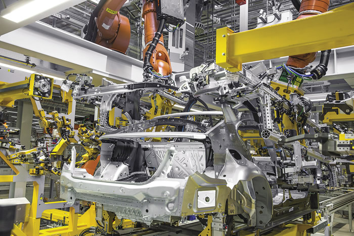 Assembly at BMW’s plant in Dingolfing, Germany. BMW has worked with NCMS to research the replacement of parts made of traditional metals with ones made of lightweight titanium alloys or carbon composites. Image courtesy BMW Group.
