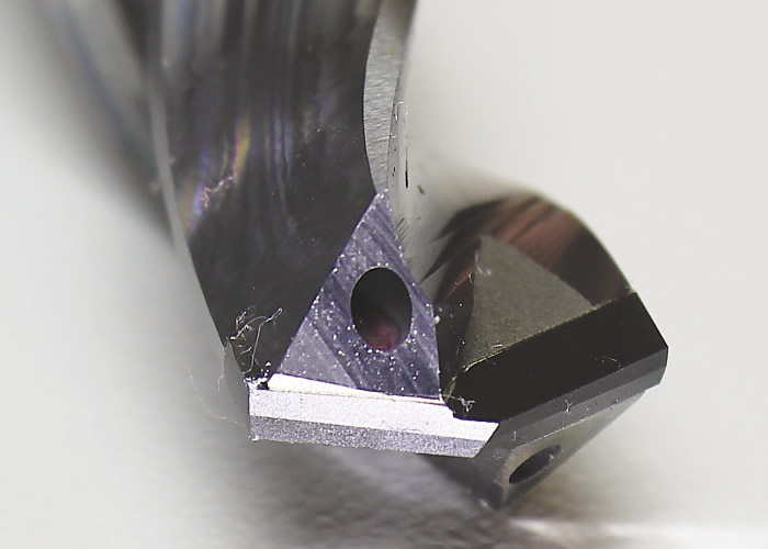 A solid, cross-center PCD-tipped drill, on which both cutting edges and the drill tip are made from a single piece of PCD. Image courtesy West Ohio Tool.