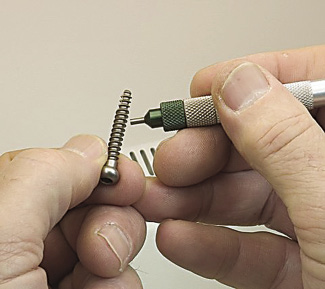 Components that go into the body, such as this bone screw, must be free of burrs to prevent metal particles from entering the blood stream. Courtesy of Comco.