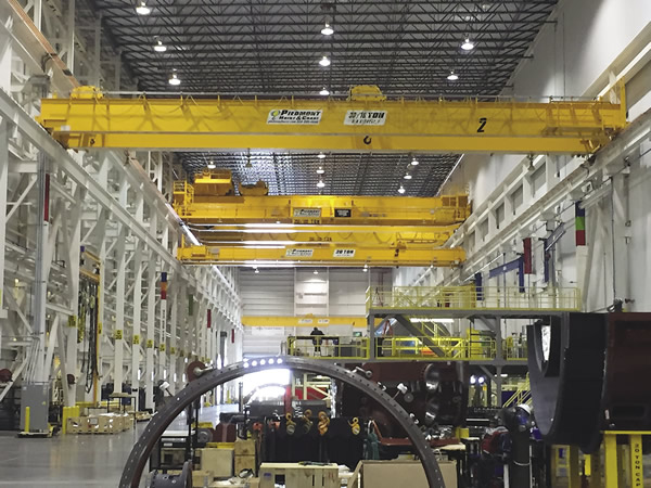 The gas turbine assembly bay is home to the shop’s largest bridge cranes. The largest two are rated at 250 tons each.  
