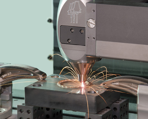 Hybrid Manufacturing Technologies’ AMBIT laser cladding head can repair parts or build them “from scratch.” Image courtesy Hybrid Manufacturing Technologies.