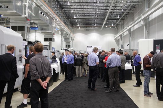 Visitors in the exhibition area in DMG MORI Manufacturing's Davis facility.