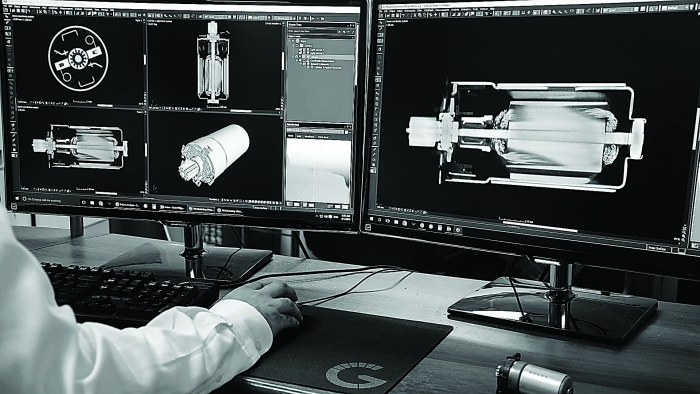 A quality engineer uses Volume Graphics software to analyze data from a scan of an electric motor. Photo credit: Jesse Garant Metrology Center