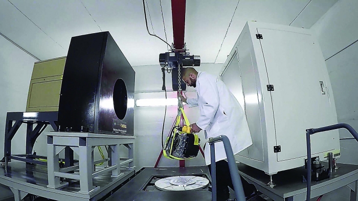 Whether a part is ultrasmall or large enough for a hoist, Jesse Garant Metrology Center’s technology manager can scan it using one of the company’s high-energy CT scanning systems. Photo credit: Jesse Garant Metrology Center