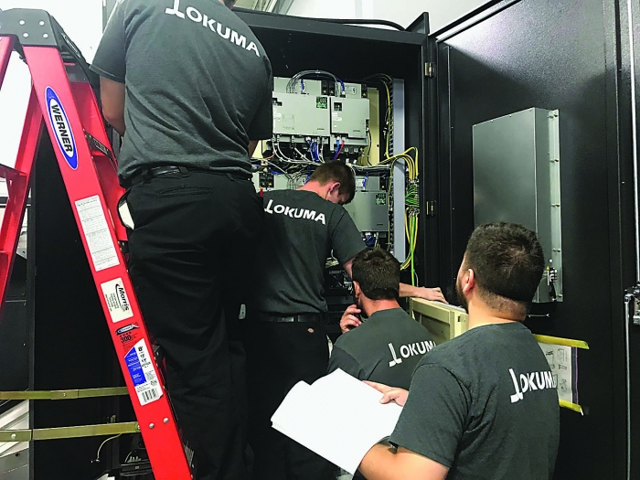 Apprentices put the theoretical knowledge they gained in classes into practice on a machine tool. Photo credit: Okuma America