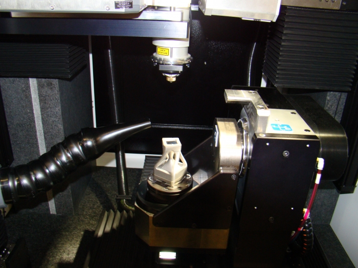 The Microlution ML-10 laser micromachining platform can process parts up to 1' tall and has a repeatability of +/-0.5µm.