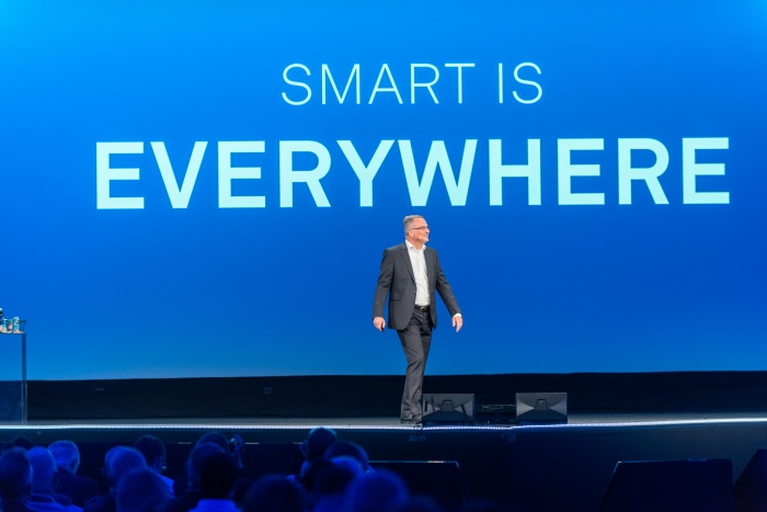 Norbert Hanke, president of Hexagon Manufacturing Intelligence, presents his smart-themed keynote. Image courtesy of Hexagon.