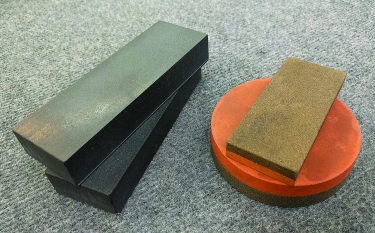 Figure 2. Flat stones have one or more of their large surfaces precision-ground flat and parallel on a surface grinder with a diamond wheel. Image courtesy of Tom Lipton.