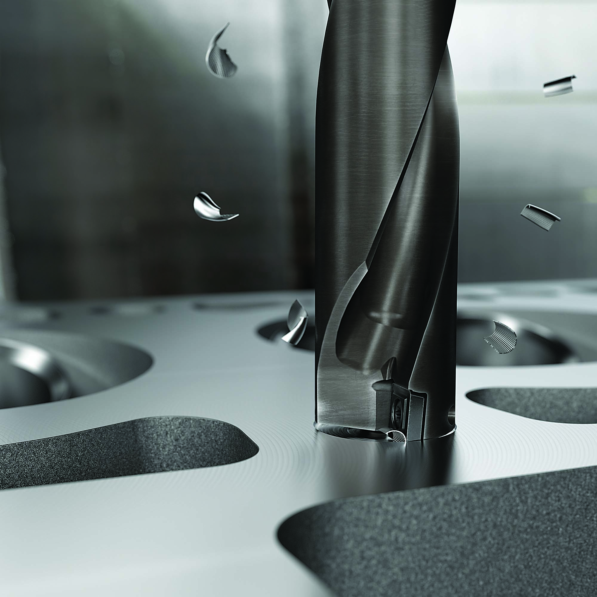 A CoroDrill 880 drill is tooled with CVD-coated inserts.